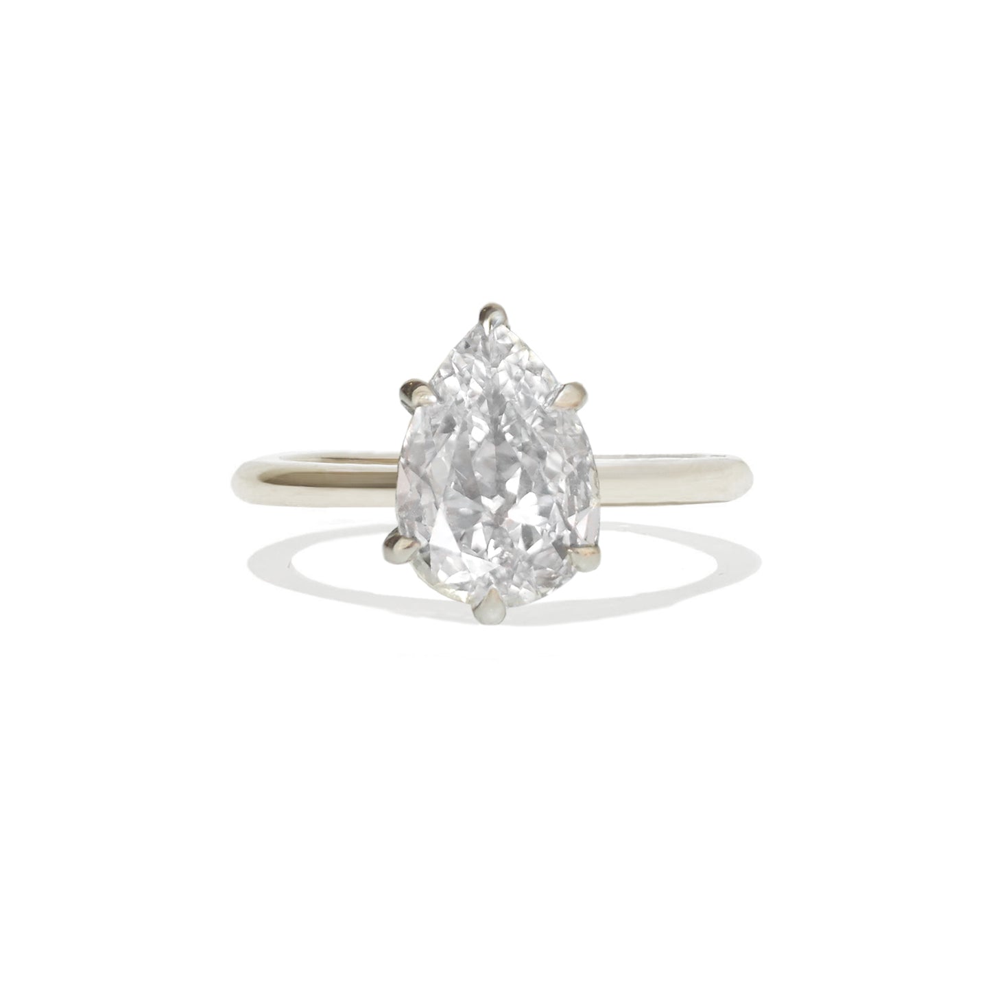 A captivating lab-grown antique pear-shaped diamond creates a vintage-inspired yet modern bridal set full of sparkle and elegance.