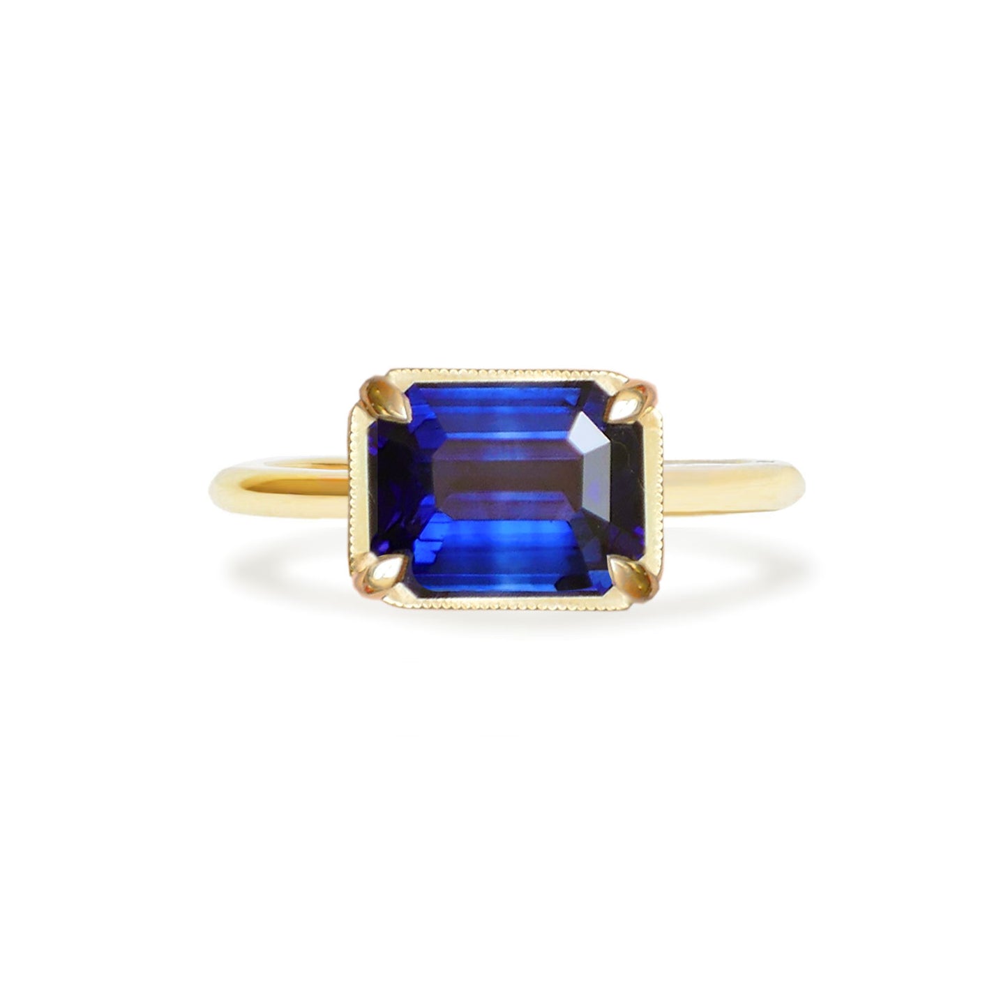 East West Emerald Cut Sapphire Solitaire