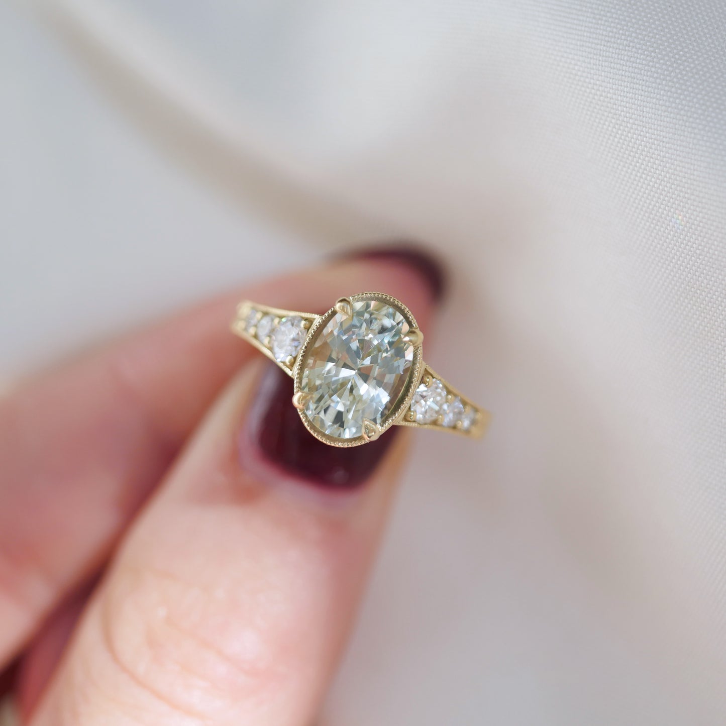 Custom Oval Mint Sapphire and Diamond Ring
