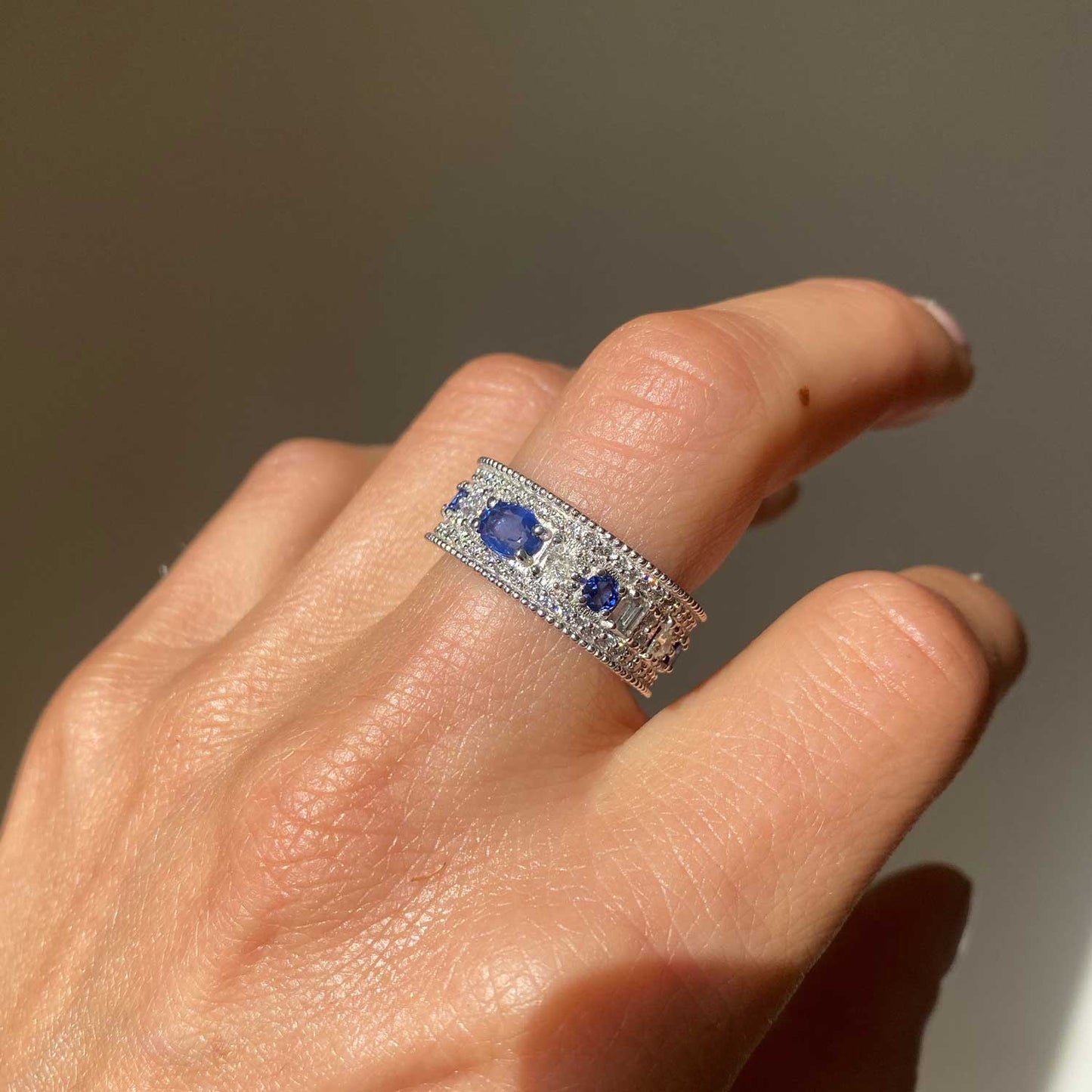 Custom East West Oval Rose Cut Ring with 3/4 diamond pattern & Cylon Sapphires