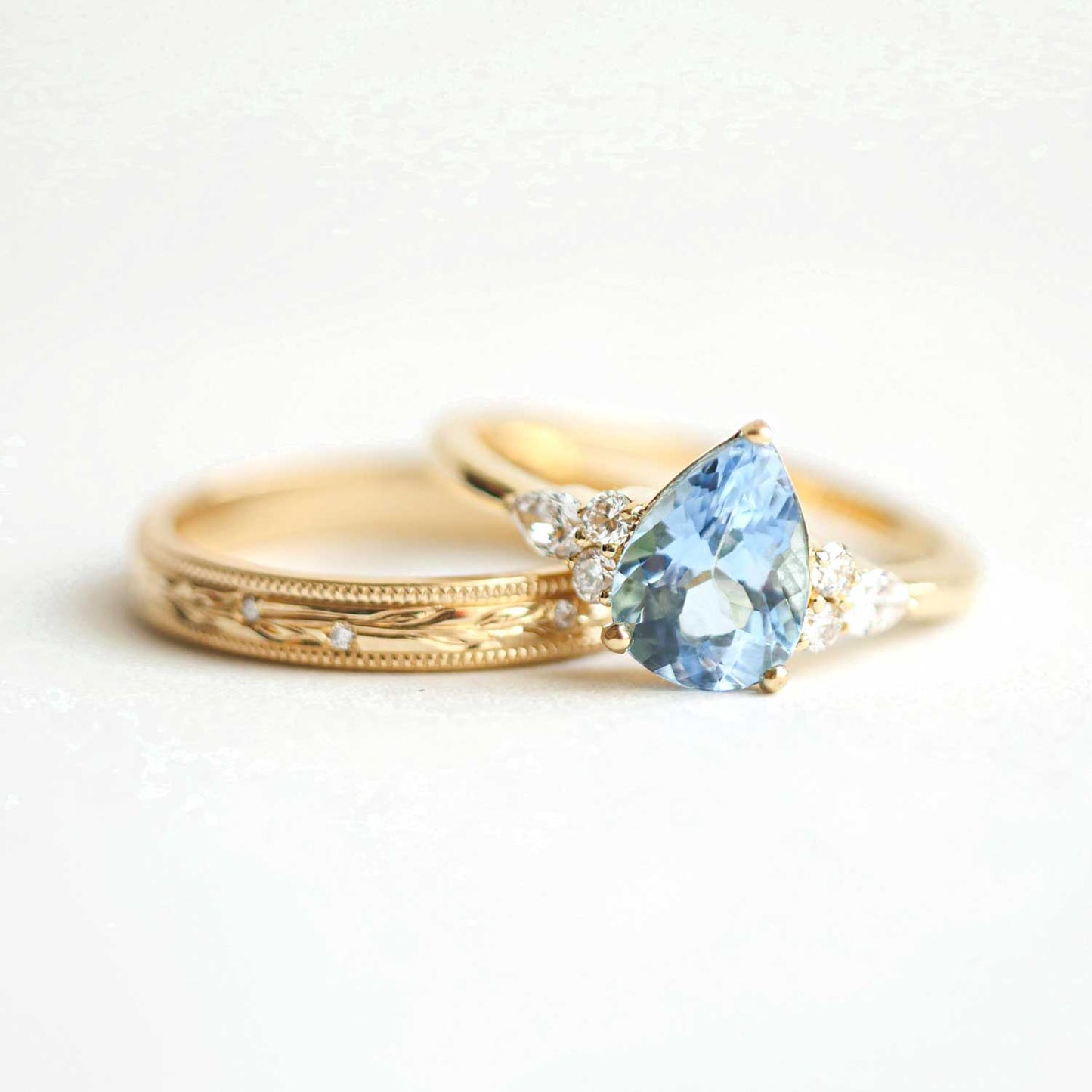 Custom Aquamarine, Pear, and Round Diamond Engagement Ring