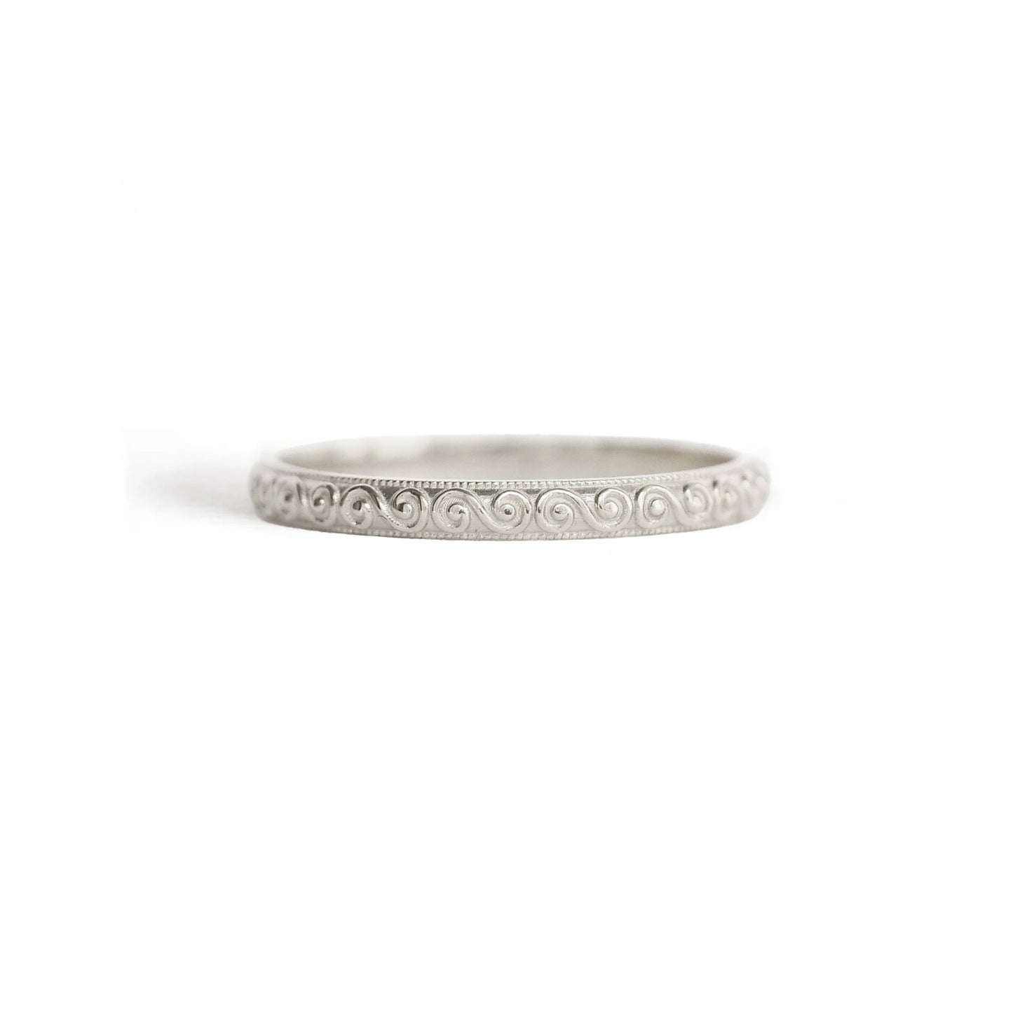 14k white gold wedding band with engraved wind spiral design