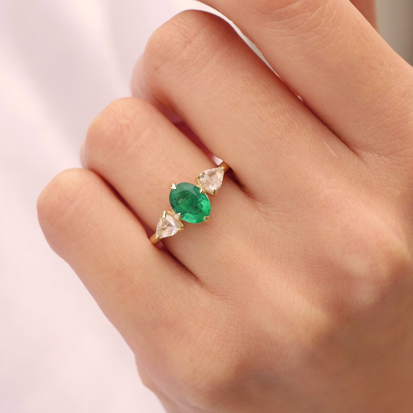 Oval Emerald & Trillion Diamond Ring