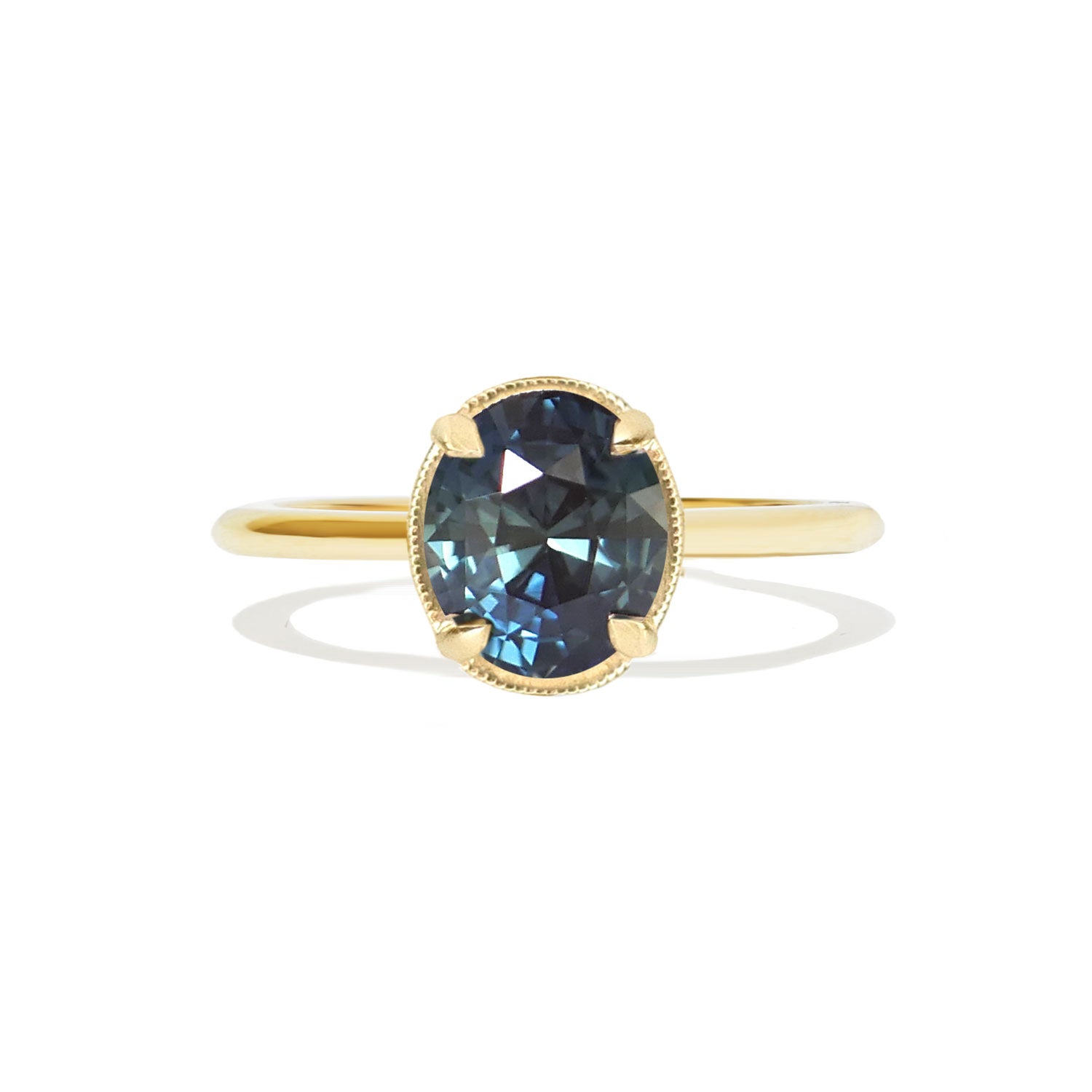 Oval Teal Sapphire Solitaire Ring