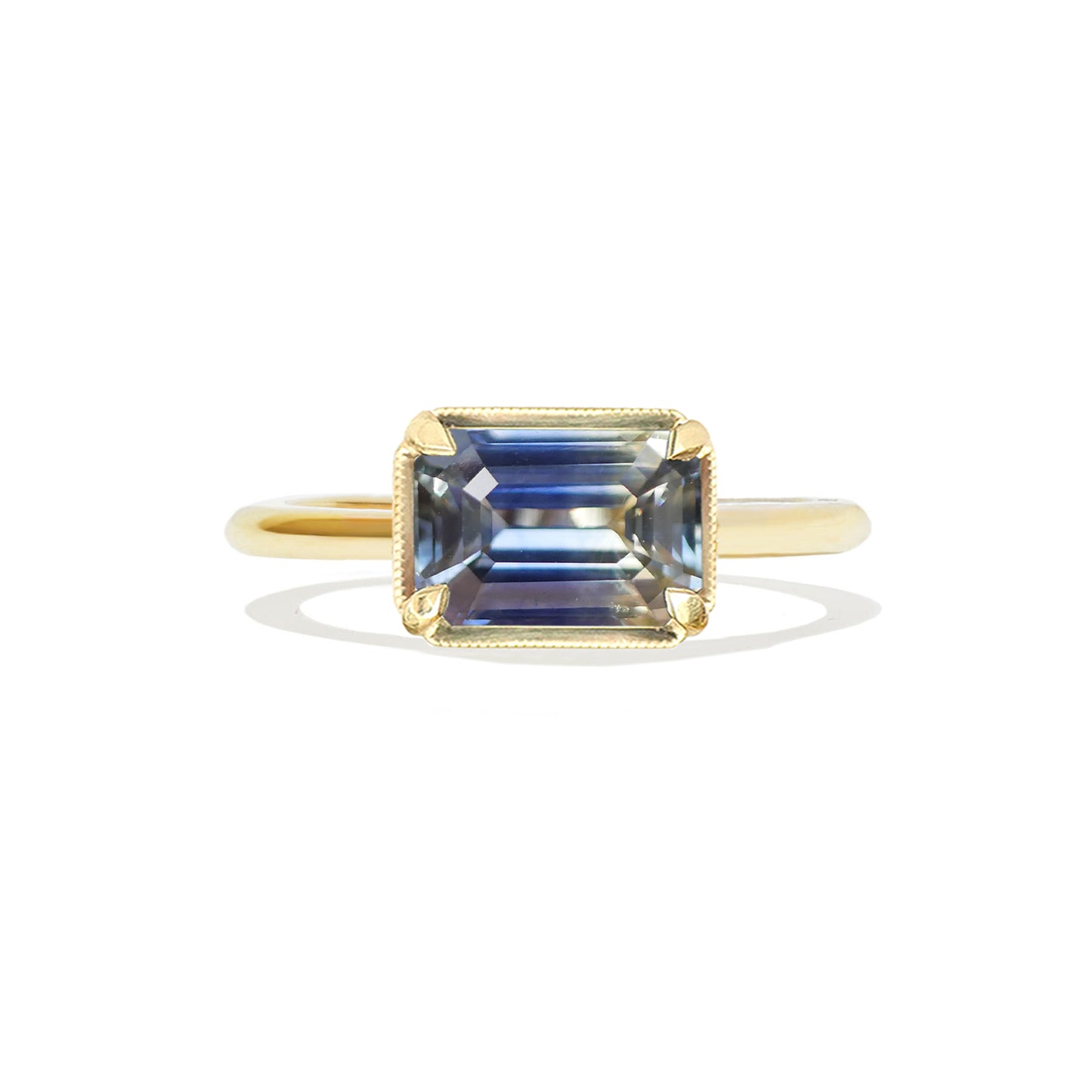 East West Emerald Cut Bi Color Sapphire Solitaire