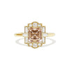 Gold ring with a natural champagne diamond and diamond accents
