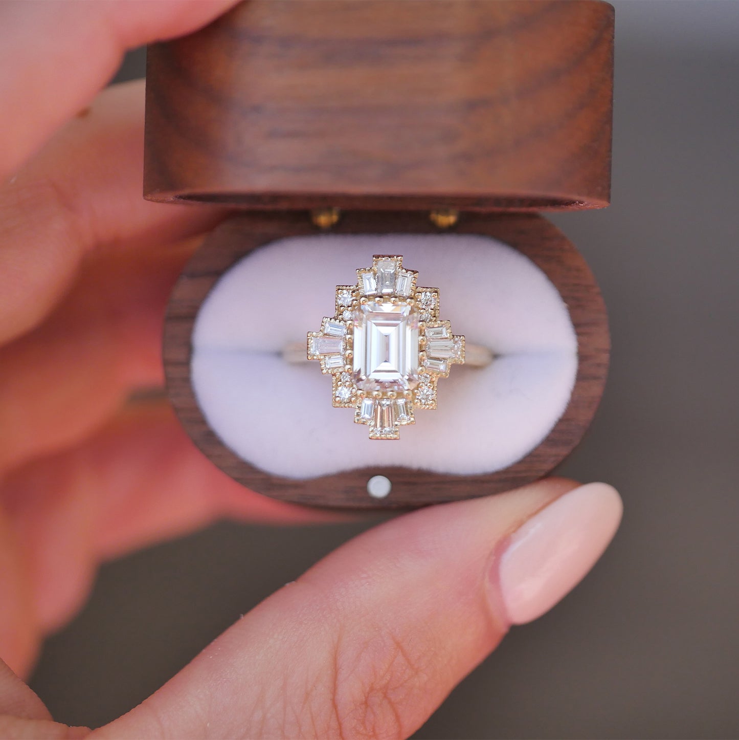 vintage wooden box featured vintage inspired engagement ring with moissanite center and surrounding natural diamonds