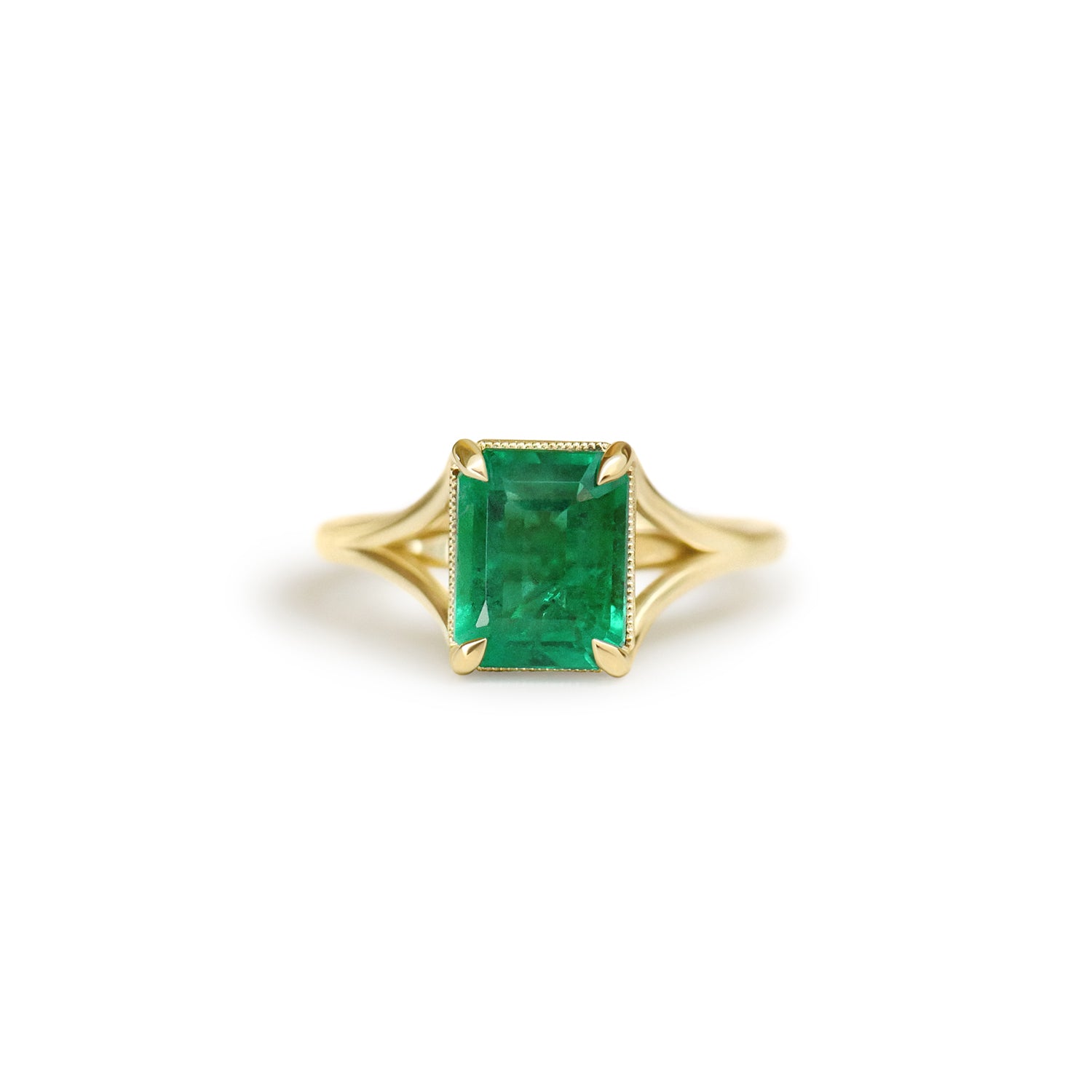 Custom Natural Emerald Split Shank Solitaire