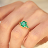 Emerald Bezel Trio Engagement Ring