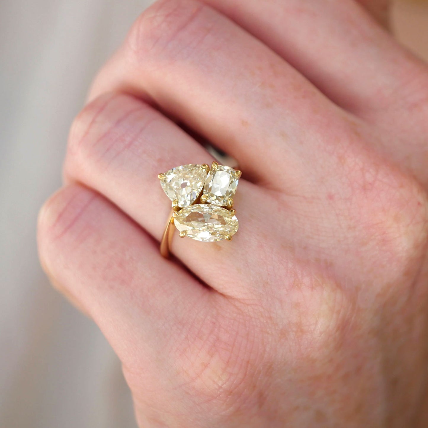 Trillion Oval and Cushion Trio Ring