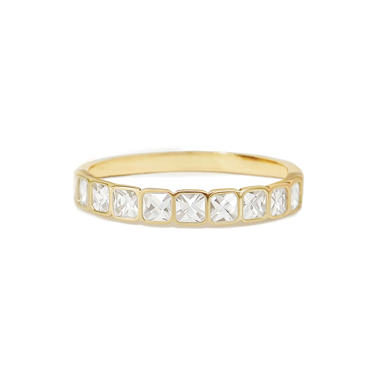 The French Cut Diamond Bezel Band showcases an elegant design where each diamond is meticulously set within a sleek bezel, creating a sophisticated and modern aesthetic.