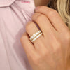 This ring combines the beauty of French cut diamonds with the durability of a bezel setting, making it a perfect choice for both everyday wear and special occasions.