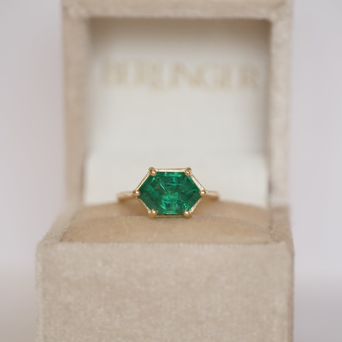 Elongated Hexagon Emerald Solitaire Ring