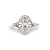 A breathtaking split shank engagement ring featuring oval brilliant cut diamond creating a stunning, elegant ring. Set in 14k white gold.