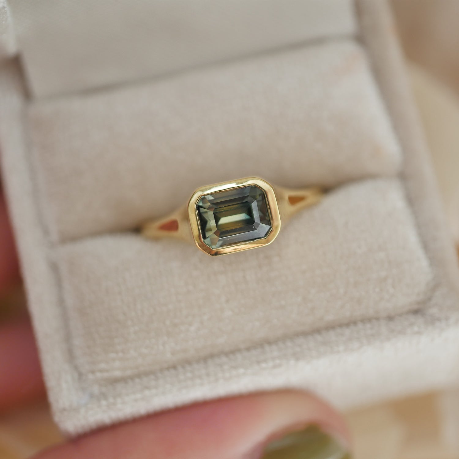 Custom Bezel Bi-Color Emerald Cut Sapphire