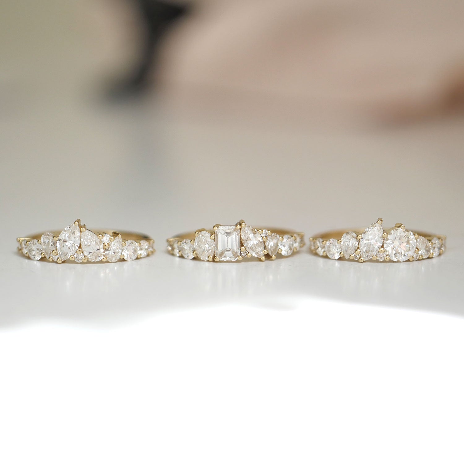 Each diamond in the Emerald & Marquise Firework Diamond Mosaic Band is carefully set to create a stunning visual effect, reminiscent of a burst of fireworks lighting up the sky.