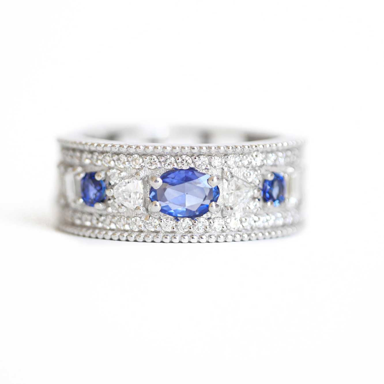 Custom East West Oval Rose Cut Ring with 3/4 diamond pattern & Cylon Sapphires
