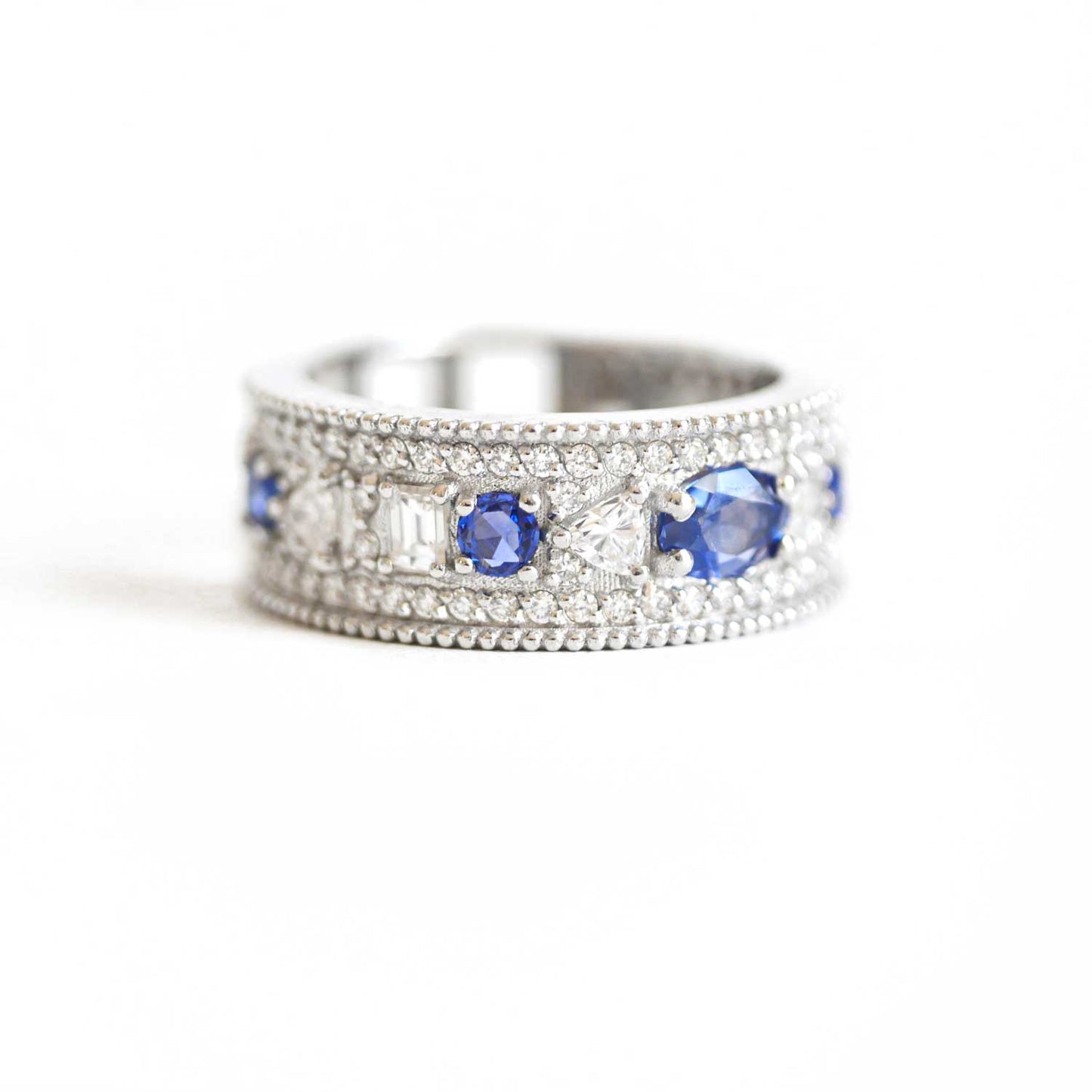 Custom East West Oval Rose Cut Ring with 3/4 diamond pattern & Cylon Sapphires