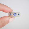Custom East West Oval Rose Cut Ring with 3/4 diamond pattern & Cylon Sapphires