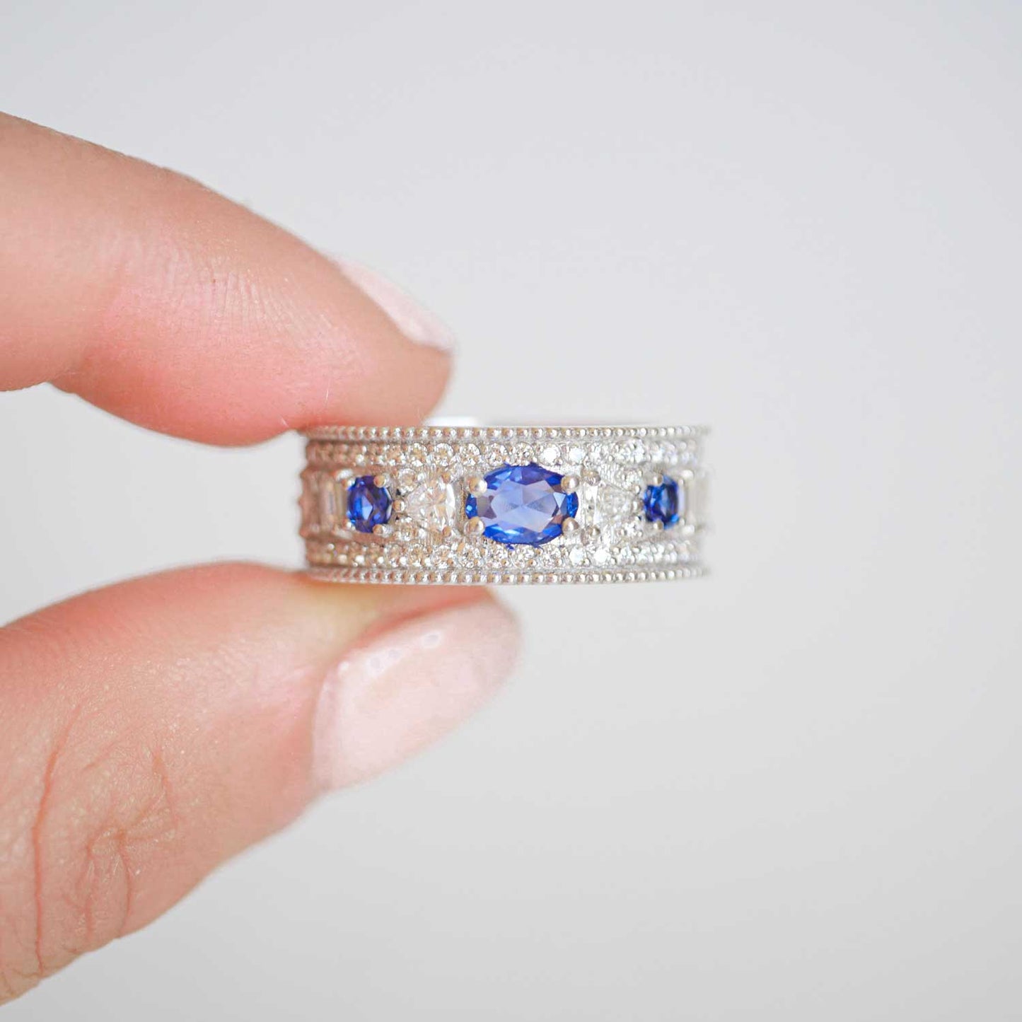 Custom East West Oval Rose Cut Ring with 3/4 diamond pattern & Cylon Sapphires