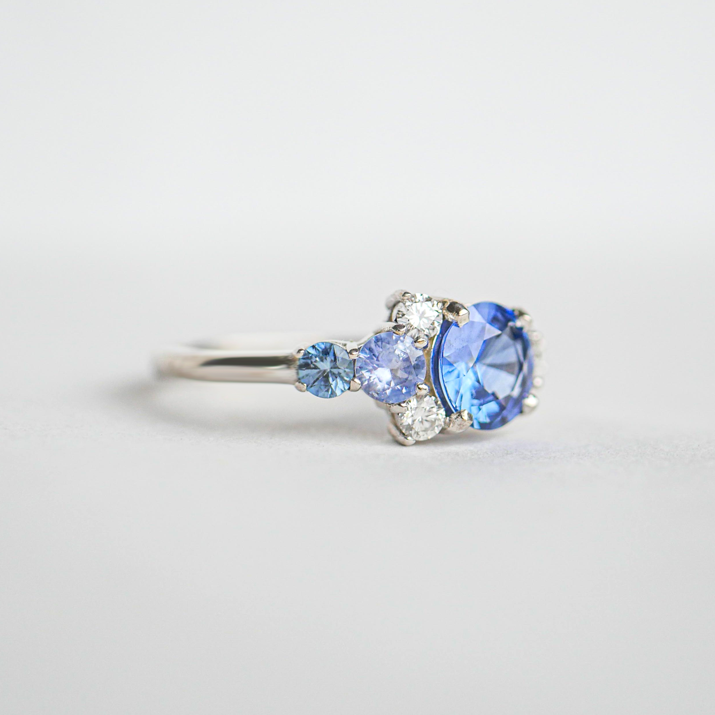 Custom Round Blue Sapphire & Diamond Cluster Mosaic Engagement Ring