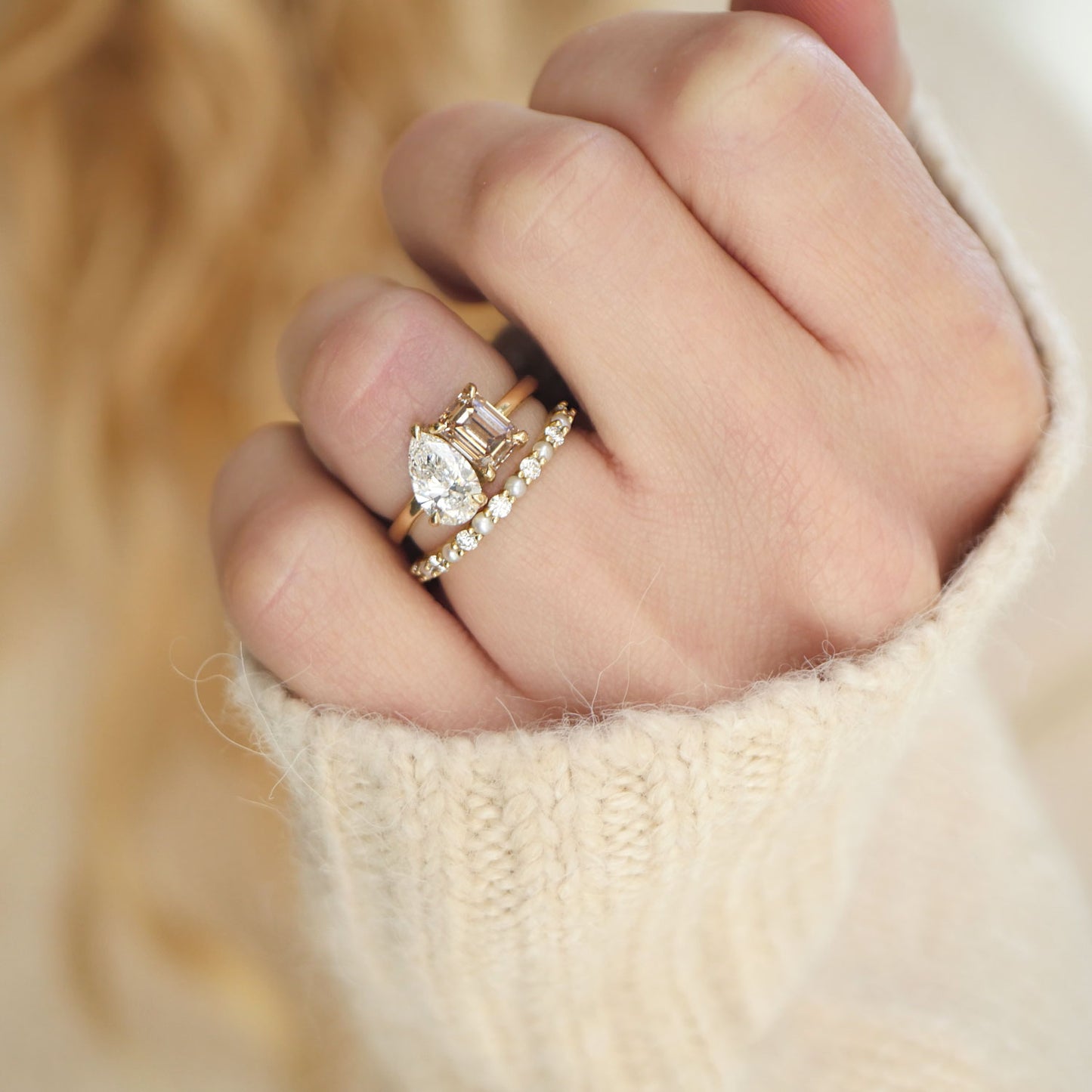 With its striking pear-shaped and champagne emerald diamonds, this toi et moi ring offers a sophisticated, modern twist on a classic design, perfect for the couple who values individuality.